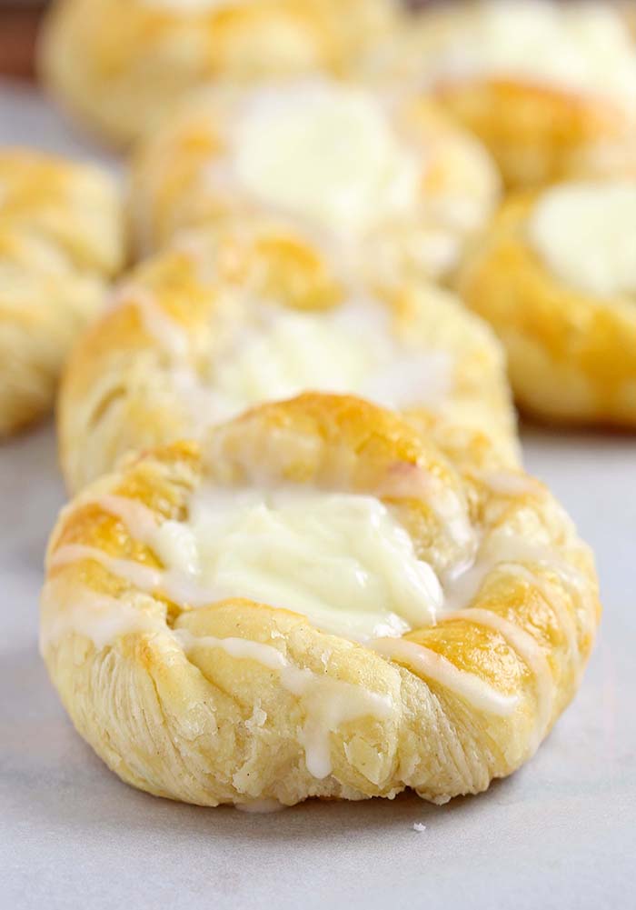 This quick and easy cream cheese danish starts with store-bought crescent roll dough, and can be made, start to finish in under 30 minutes. 