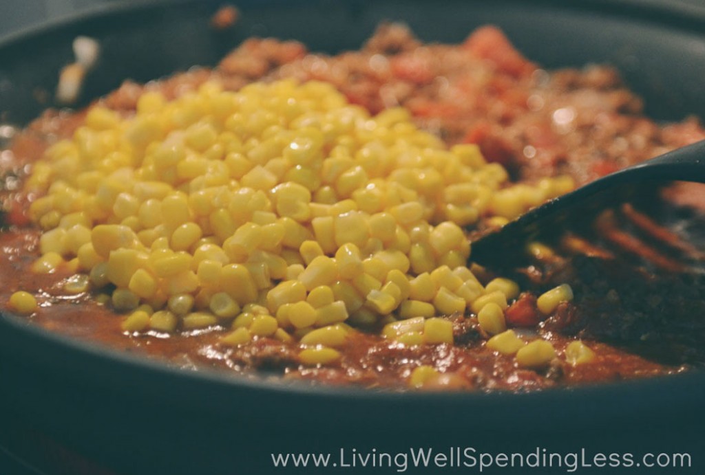 Stir in a can of yellow corn to the goulash mixture. 